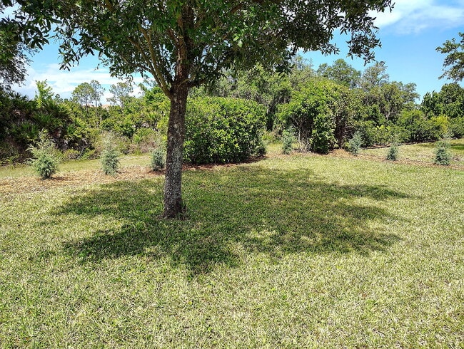 Building Photo - "Resort-Style Living in Davenport: Spacious 4-Bedroom Home with Solar Panels, Internet Included &...