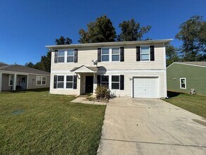 Building Photo - Fenced yard in Toney
