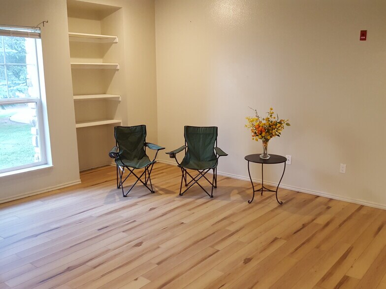 New wood flooring, bookcases - 900 Bitner Rd