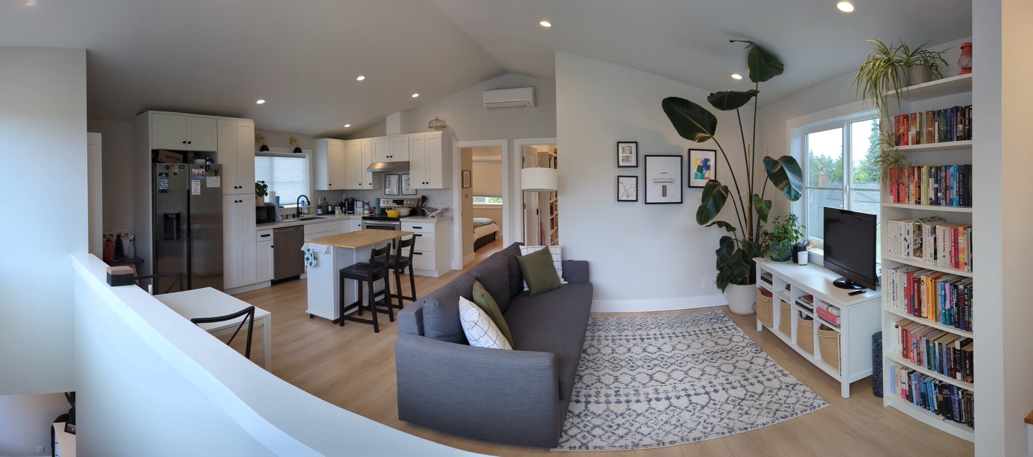 Large open living room into kitchen with central heating and cooling! - 3240 29th Ave W