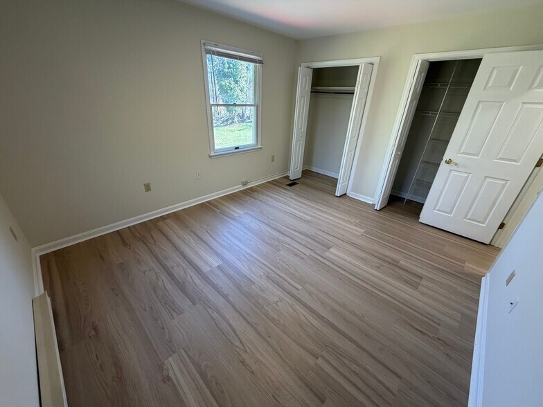 Spacious closets in primary bedroom - 104 E Poplar St