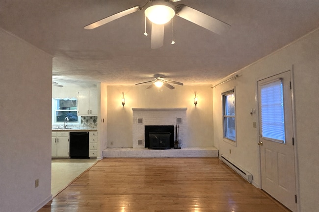 Building Photo - Light-Filled 3BR Home with Wraparound Deck, Convenient to Town