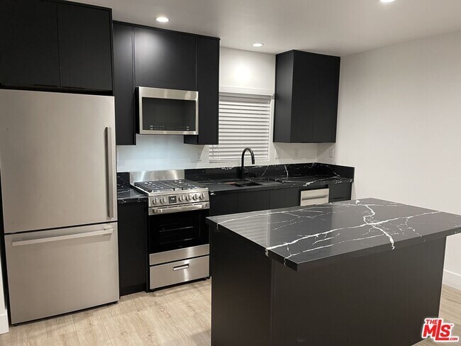 Building Photo - 9504 Gothic Ave