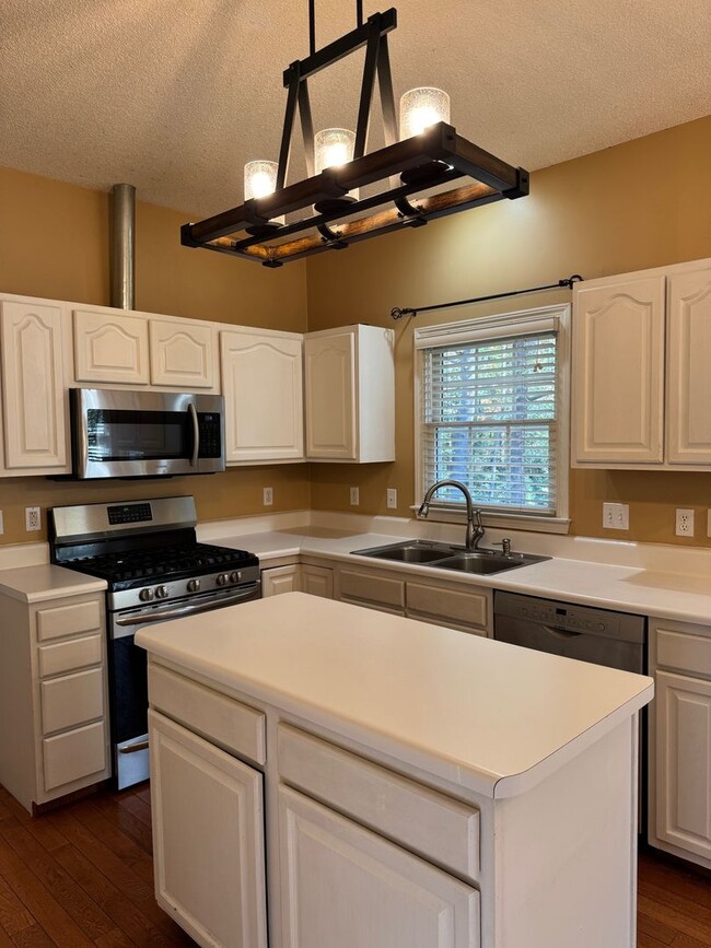 Building Photo - Fletcher - Four Bedroom, Lawn Care Included
