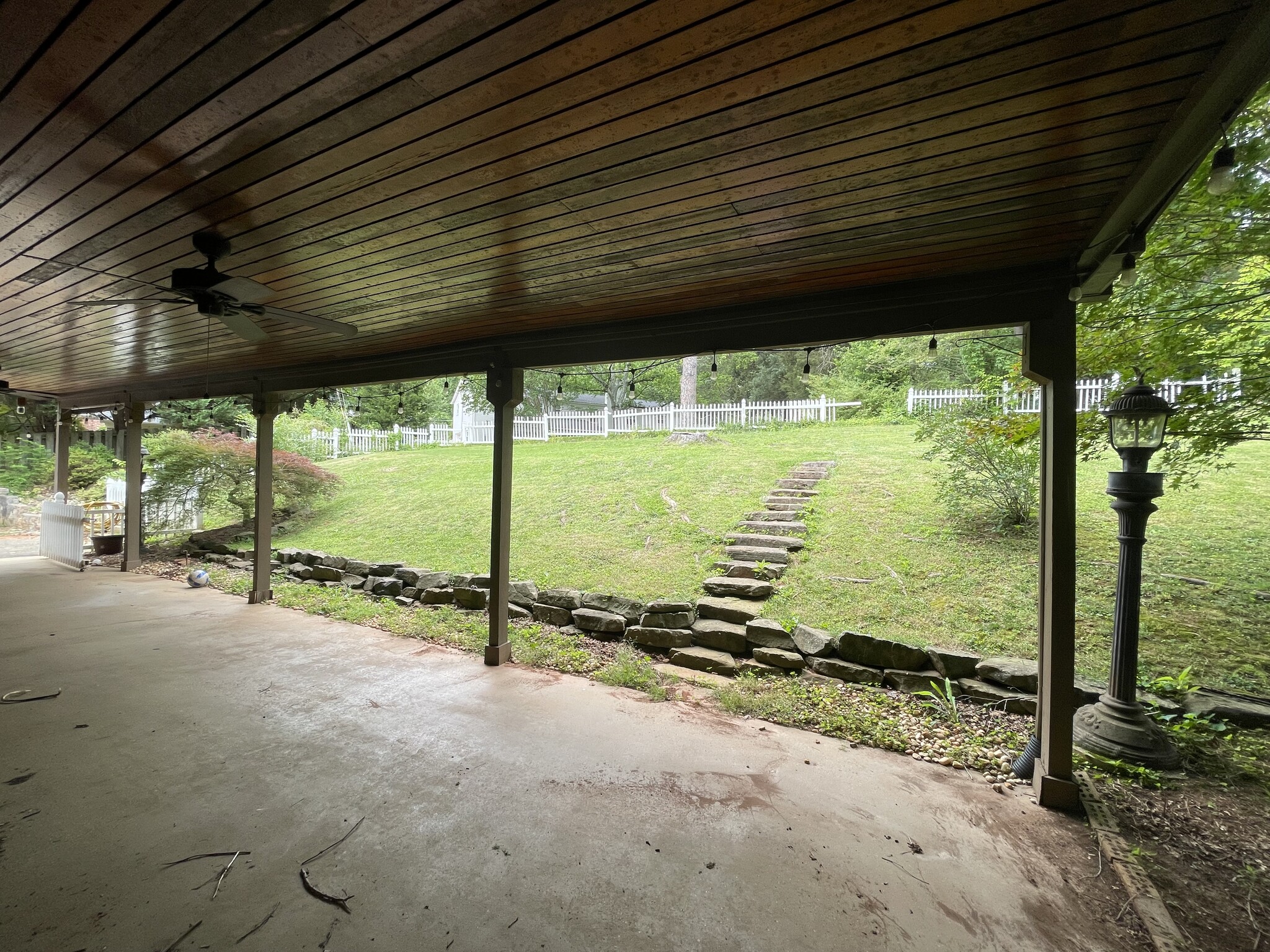 Covered backyard w/ceiling fans for comfortable outdoor seating - 8205 Ainsworth Dr