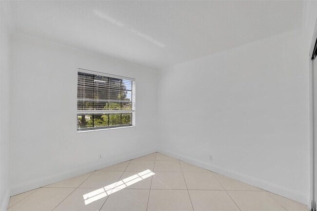 Building Photo - 12244 Royal Palm Blvd