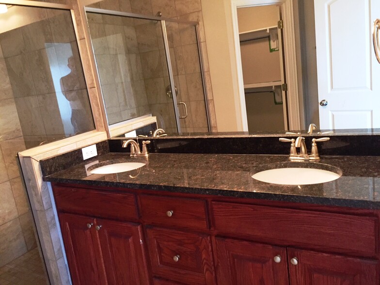 Master Bath- granite & Cabernet Cherrywood cabinets - 4917 Sanger Circle