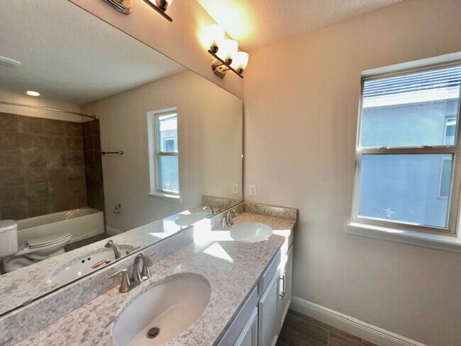 Building Photo - SPECTACULAR MODERN HOME!!Relaxing water views from the back of this beautiful home- MOVE IN Septe...