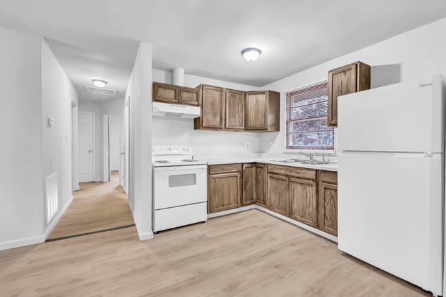 Building Photo - Cozy 3BR Home with Spacious Yard & XL Carport!