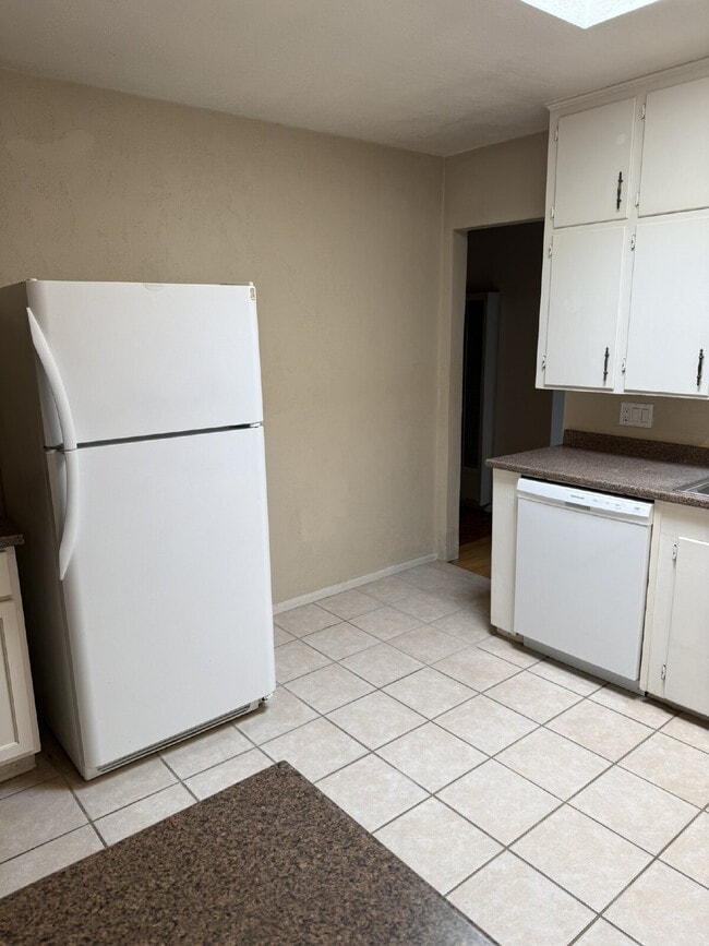 Building Photo - Charming NE Heights Cottage with Flexible Layout & Easy Access to UNM, Uptown, and KAFB