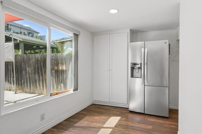 Building Photo - Modern 3BR Townhome | Garage + Driveway Parking | Yard | Pool | Pet Friendly | Move-In Ready