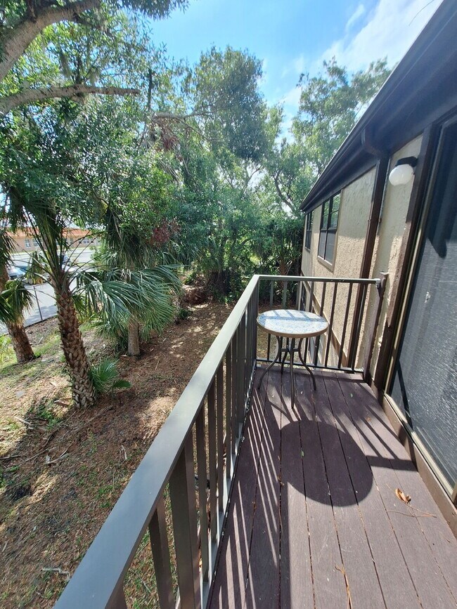 Building Photo - Second Floor Annual rental available now in the 55+ condominium community of Cedar Woods.