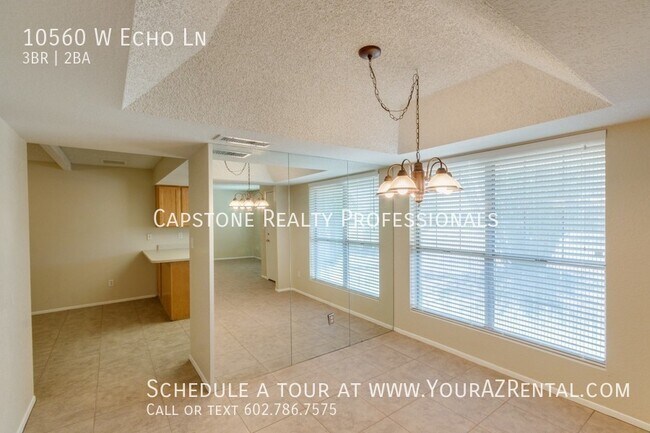Building Photo - 10560 W Echo Ln