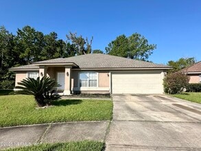 Building Photo - 6764 Gentle Oaks Dr