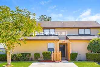 Building Photo - 8781 Whispering Pines Dr