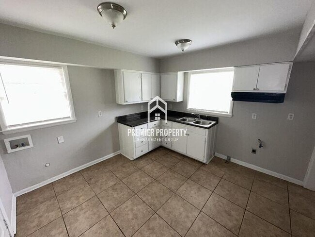 Building Photo - FIRST MONTHS RENT FREE!