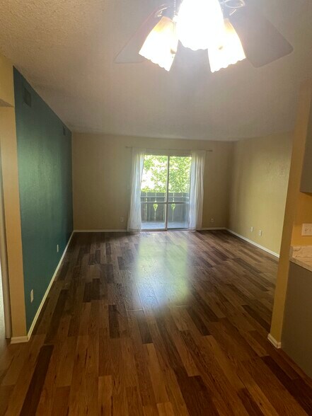 open living area with balcony - 3250 Oneal Cir