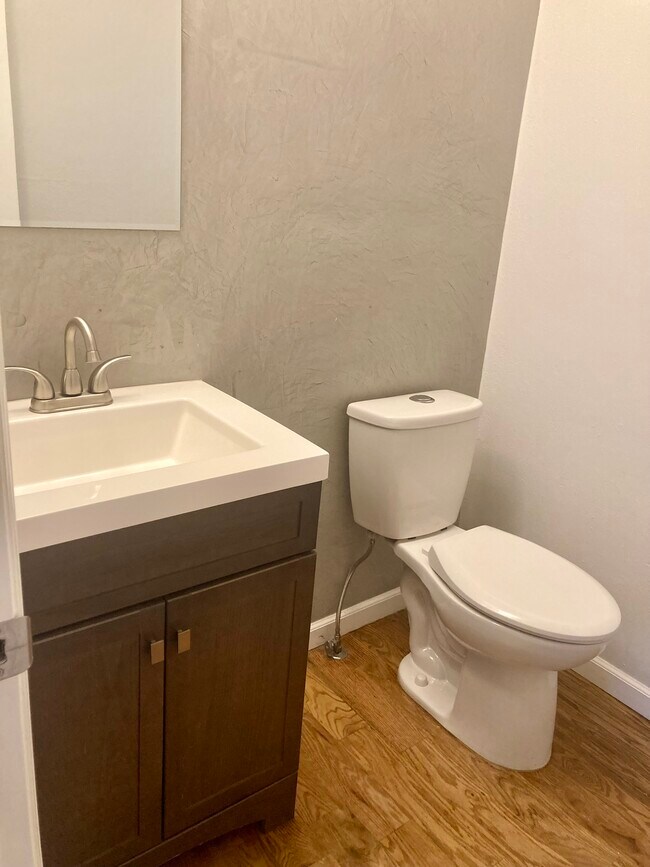 Main floor half bath - 919 S Granby Way