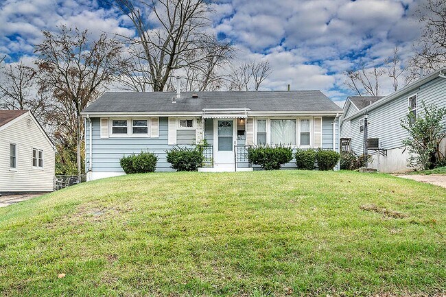 Primary Photo - 3-Bedroom Home with Hardwood Floors & Fenced Yard in St. Louis