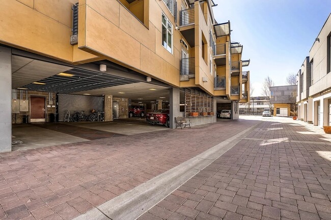 Off-street covered and gated parking garage with dedicated parking spot - 3101 Blake St