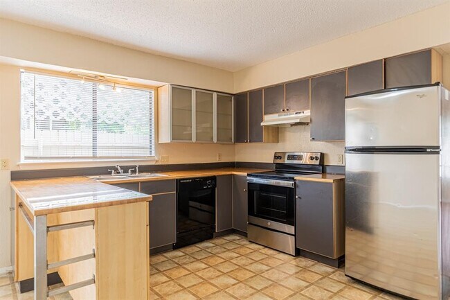 Building Photo - 9524 Quail Village Ln