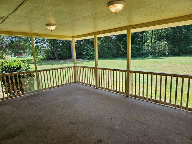 Building Photo - Charming Brick Rancher on Massive Lot – Move-In Ready!