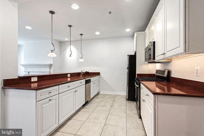 Building Photo - 8319 Quarry Manor Terrace