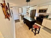 Building Photo - 8711 Blind Pass Rd