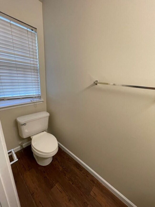Building Photo - Must see this 4 bedroom 2.5 bath townhouse with 1 car garage .