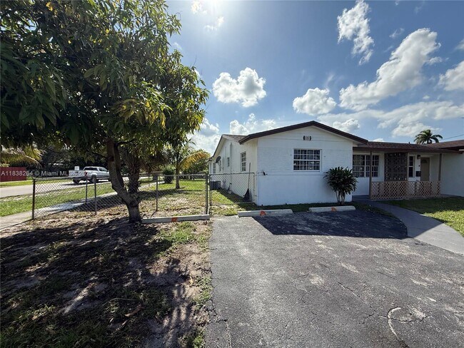 Building Photo - 1101 NW 55th Ave