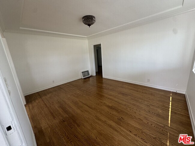 Building Photo - 6003 Bellflower Blvd