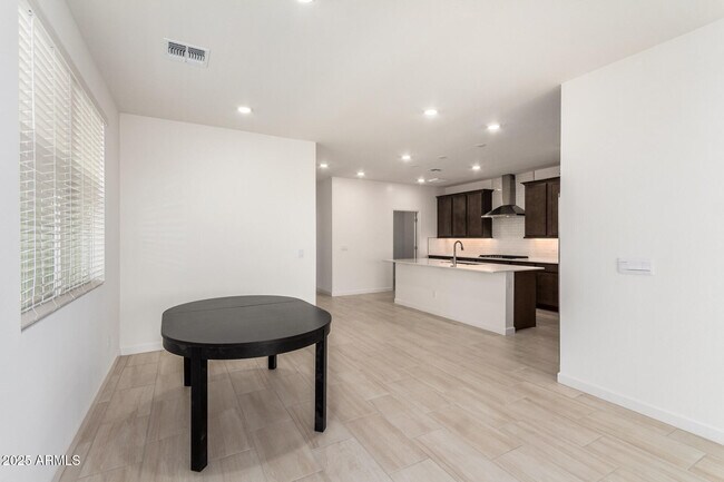 Building Photo - 6777 W Molly Ln