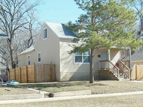 Building Photo - Four bedroom home available soon in NW Minot.