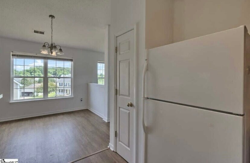 pantry and dining room in the background - 210 Seven Pines Ct