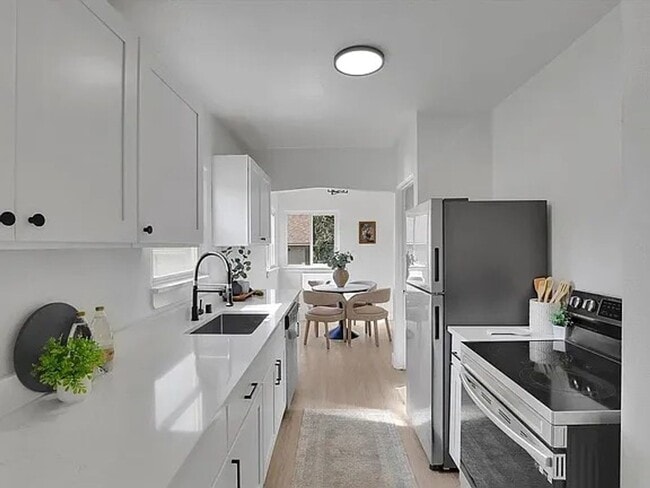 Building Photo - For Rent – Spacious 4-Bedroom, 2-Bath Home...