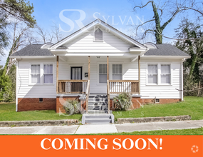 Building Photo - Welcome to this charming abode.