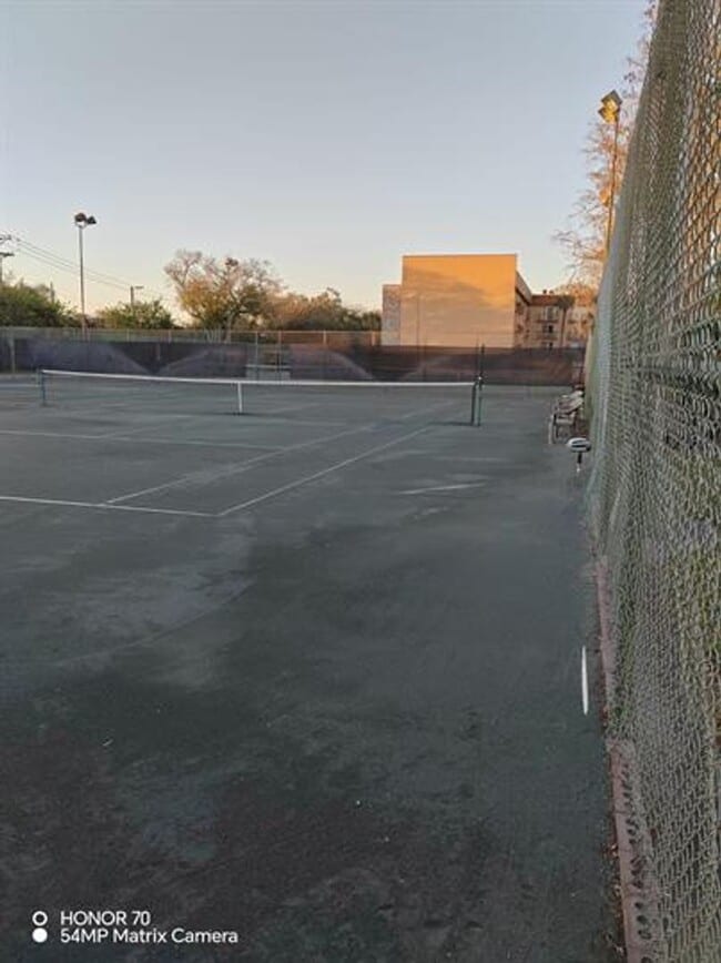 Building Photo - Welcome to Tampa Racquet Club – Where Comfort Meets Convenience!