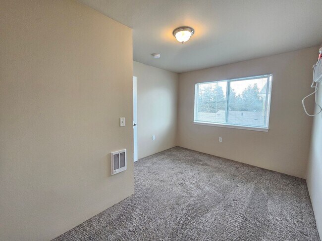 Building Photo - 5207-5207 E Upriver Dr
