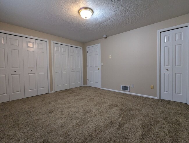 Building Photo - Beautiful 2-Bedroom, 1.5-Bath Condo. Landscaping included!