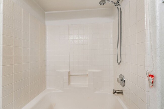 Building Photo - Modern Gated Condo with Upgraded Interior and Attached Garage in Prime South Las Vegas Location!