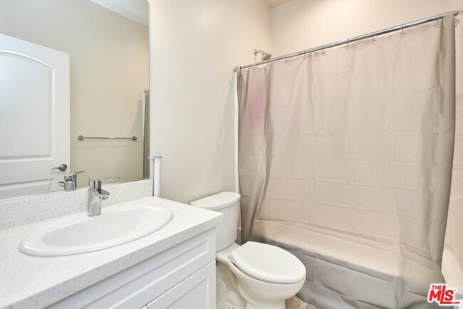 Building Photo - 9831 Alburtis Ave