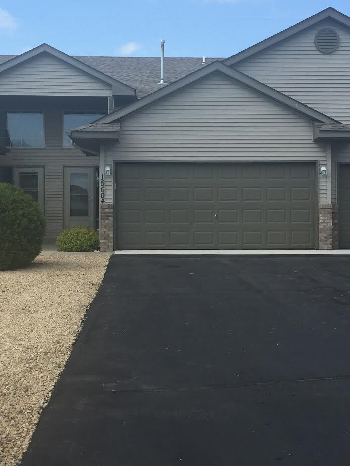 Two car garage, large flat driveway - 15604 84th St NE