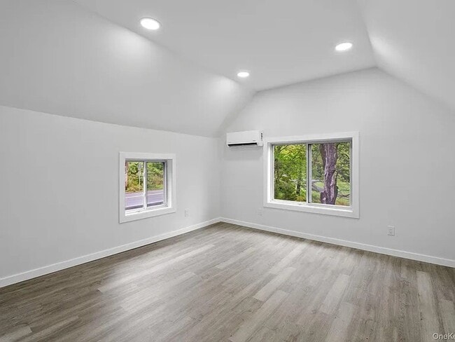Building Photo - Fully Renovated 3BR Retreat on Highland La...