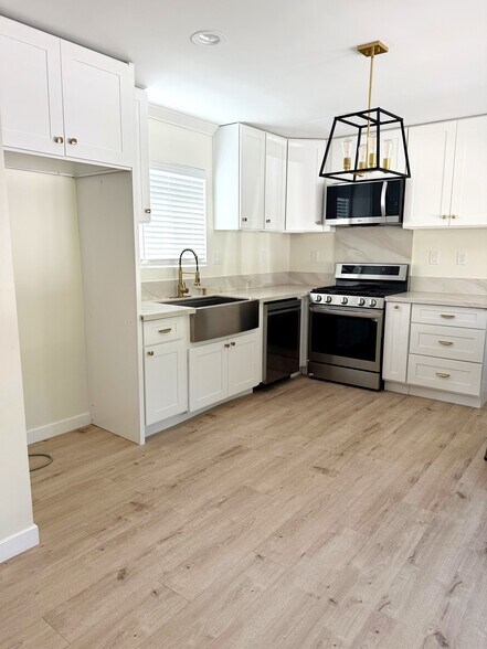 kitchen/refrigerator area - 10705 Dorothy Ave