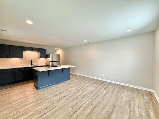 Building Photo - **OFFERING REFUNDABLE APPLICATION FEES** Newly Remodeled 2BD, 1BA Durham Duplex Walking Distance ...