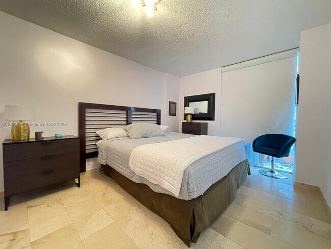 Building Photo - 8911 Collins Ave