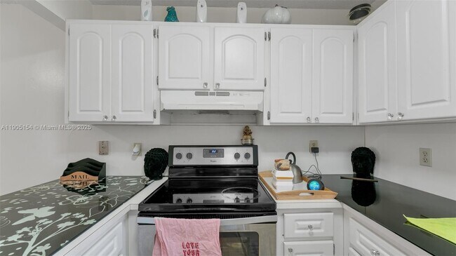 Building Photo - 7935 W 30th Ct