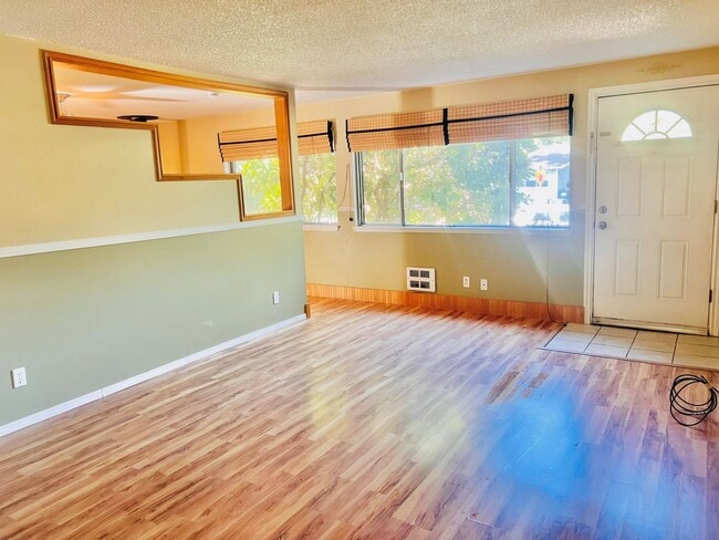 Building Photo - Charming 3BR/1BA w/ 1-car garage, long driveway, fenced yard, wood stove & shed/workshop.