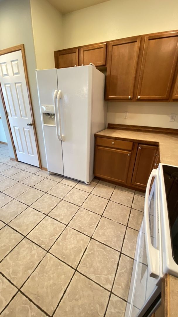 Building Photo - Triple Car Garage & New Interior Paint