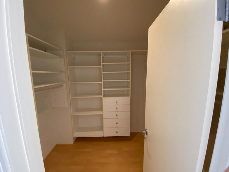 Walk-in Closet with closet organizers - 44 Iron Horse Ln
